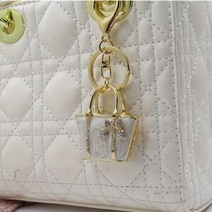 Chic White Bag Charm with Gold Details NWT